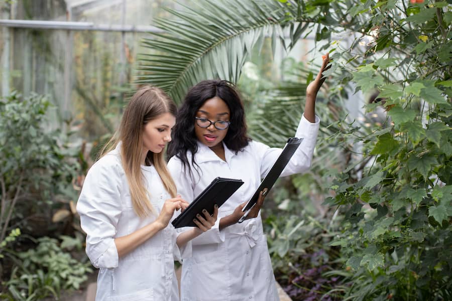 women-agricultural-engineers-standing-in-front-2023-11-27-04-53-17-utc